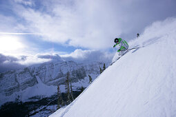 Skier on slope, Castle Mountain ski resort, Alberta, Canada