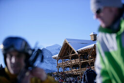 Two skiers at the base station at Lake Louise ski resort, Lake Louise, Alberta, Canada