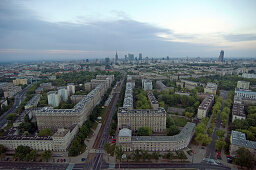View over blocks of houses and streets in the city at dawn, Warsaw, Poland