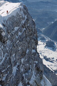 Mountaineer on a ridge, Ehrwald, Wetterstein Range, Tyrol, Austria