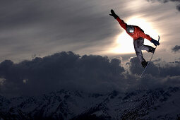 Snowboarder jumping, See, Tyrol, Austria