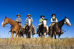 Cowboys sitting on horses, wildwest, Oregon, USA