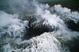 Lava flow, Pu'u O'o crater, flowing into the sea near Kamoamoa, Kilauea, Big Island, Hawaii, USA