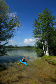 kayakers on lake Fohnsee, Osterseen, Upper Bavaria, Bavaria, Germany