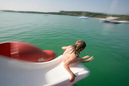 Girl on slide, Lake Woerthsee, Bavaria, Germany, MR