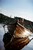 Boy (3-4 years) in a rowboat on Lake Staffelsee, Upper Bavaria, Bavaria, Germany, MR