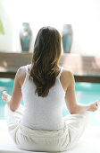 Frau beim Meditieren, Entspannung, Gesundheit, Wellness