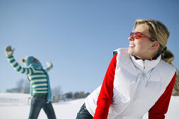 Two women standing in snow, Styria, Austria
