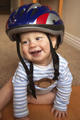 baby with bike helmet