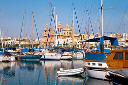 Sailing boats at the marina in front of St. Joseph Church, Msida, Malta, Europe