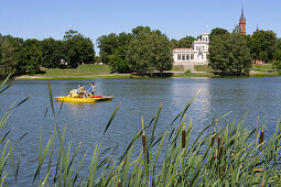 Boatride on Lake Druskonis. In the back: Druskininkais cultural center and the church of St. Mary, Lithuania