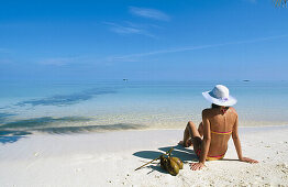 Woman on a beach in Ari Atoll. Maldives