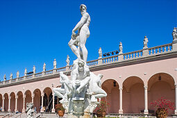 Fountain with sculptures in front of the Ringling Museum of Art under blue sky, Sarasota, Florida, USA
