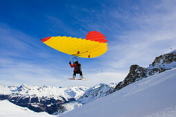 Snowboarder mit einem Woody-Jump, Grimentz, Wallis, Schweiz