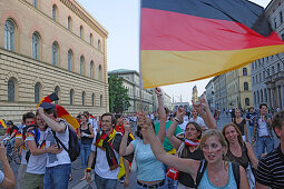 German soccer fans celebrating on Leopoldstrasse, Maxvorstadt, Munich, Bavaria, Germany