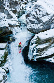 Man kayaking in Strumboding Water Fall in winter, Upper Austria, Austria