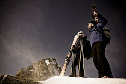 Couple backcountry skiing at Sonnblick range, Hohe Tauern National Park, Rauris, Salzburg (state), Austria