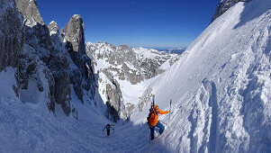 Two backcountry skiers ascending, Griesner Kar, Wilder Kaiser, Kaiser range, Tyrol, Austria