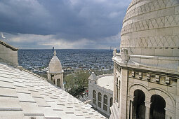 Detail of basilica Sacre Coeur under clouded sky, Montmartre, Paris, France, Europe