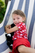 Girl, 4-5 years, in a hammock
