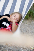 Girl, 4-5 years, sleeping in a hammock