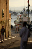 View towards the yacht harbour from a side street, Promenade, St.Tropez, Cote d´Azur, Provence, France