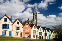 Row of houses, colourful terrace houses with cathedral in the background, West View in Cobh, County Cork, Ireland, Europe