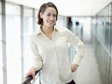 Businesswoman smiling at camera, Munich, Bavaria, Germany