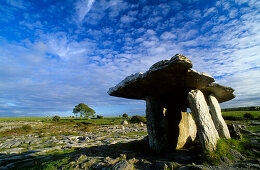 Poulnabrone Dolmen in the Burren under clouded sky, County Clare, Ireland, Europe