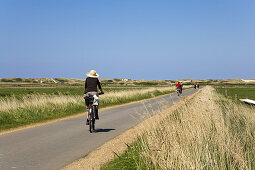 Cyclists on the way, Amrum Island, Schleswig-Holstein, Germany