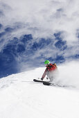 Young man downhill skiing, Stockhorn, Zermatt, Canton of Valais, Switzerland