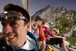 Group of hikers resting, Wetterstein range, Bavaria, Germany