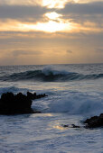 Waves breaking on rocks at sunset, near Guincho Beach, Costa de Lisboa, District of Lisbon, Estremadura, Portugal, Atlantic