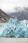 The Dawes Glacier under clouds, Endicott Arm, Inside Passage, Southeast Alaska, USA