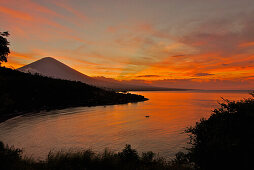 Sunset at the coast and view at Gunung Agung volcano, Bali, Indonesia, Asia