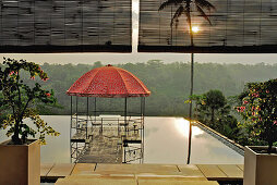 Water basin with pavilion on the roof of a restaurant, Kupu Kupu Barong Resort, Ubud, Indonesia, Asia