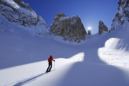 Woman backcountry skiing, Cadini range, Dolomites, Trentino-Alto Adige/Südtirol, Italy