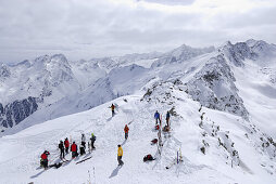 Group of backcountry skiers at Lamsenspitze, Sellrain, Stubai range, Tyrol, Austria