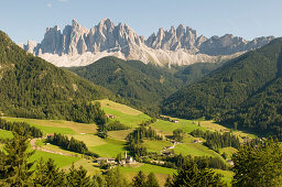 Mountain landscape and mountain village St. Magdalena, Villnoess valley, Dolomites, Geisler Group, South Tyrol, Italy