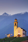 Illuminated San Sebastiano church in UNESCO World Heritage Site Bellinzona, Bellinzona, Ticino, Switzerland