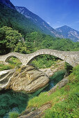 The stone bridge Ponte dei Salti under blue sky, Valle Verzasca, Ticino, Switzerland, Europe