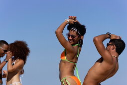 Young couple dancing salsa at beach, Playas del Este, Havana, Ciudad de La Habana, Cuba, West Indies