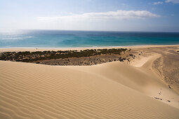 Dune on the waterfront in the sunlight, Playa de Satovento de Jandia, Parque Natural de Jandia, Jandia peninsula, Fuerteventura, Canary Islands, Spain, Europe