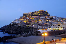 Houses and castle on the waterfront in the evening, Castelsardo, North Sardinia, Italy, Europe