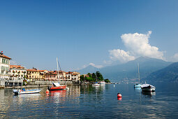 View over Lake Como to Menaggio with Bergamo Alps in background, Menaggio, Lombardy, Italy