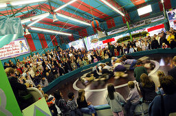 People at the attraction Teufelsrad, Oktoberfest, Munich, Bavaria, Germany, Europe