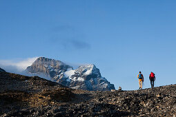 Two mountaineers ascending to Clariden, Canton of Uri, Switzerland