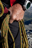Climber holding a rope, Clariden, Uri, Switzerland