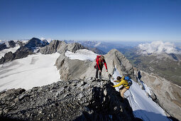 Two mountaineers ascending to summit, Clariden, Canton of Uri, Switzerland