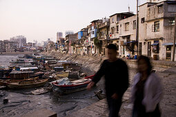Old harbour with fishing boats at low tide, Siming district, Xiamen, Fujian province, China, Asia